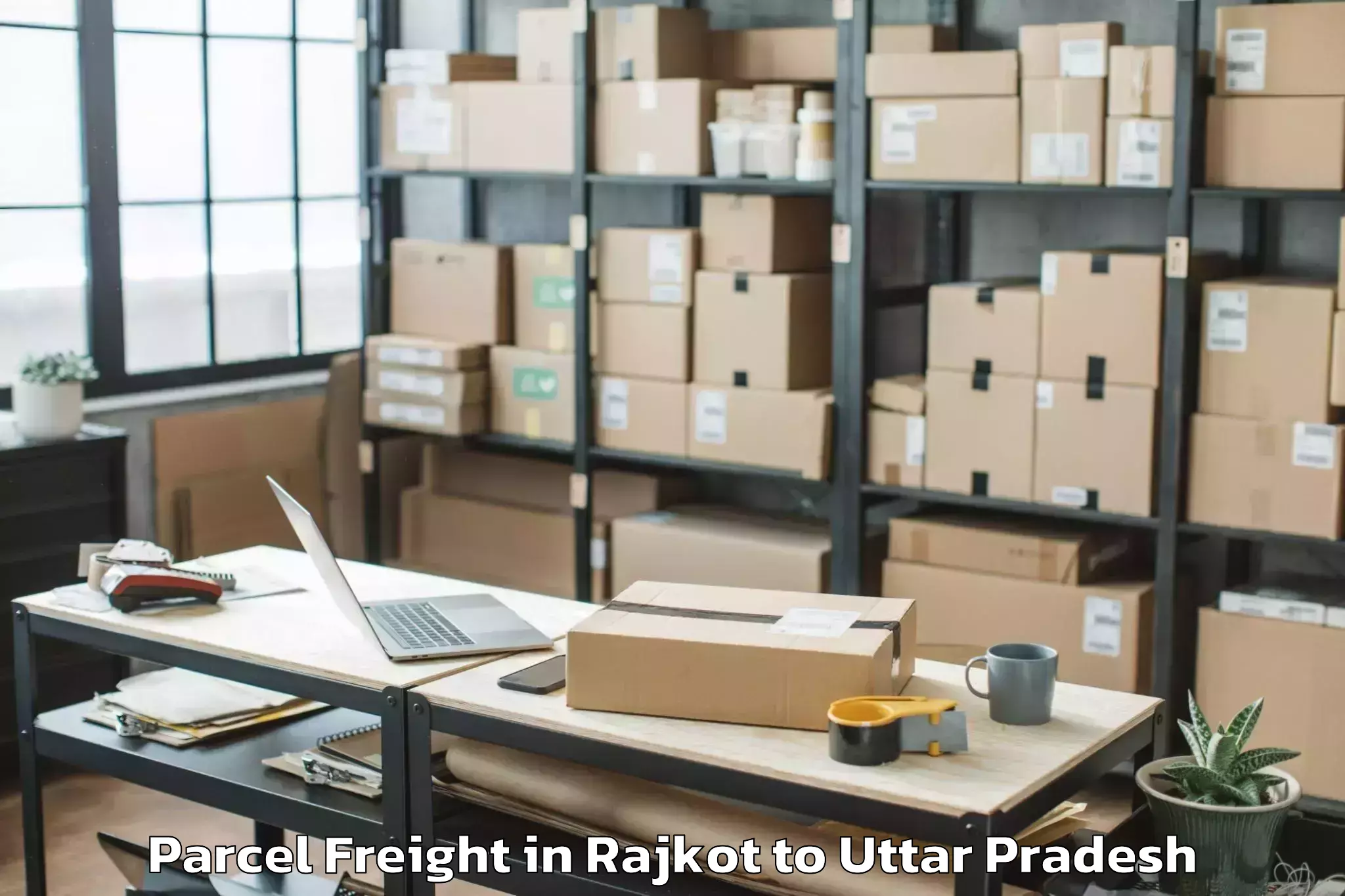 Book Rajkot to Muhammadabad Parcel Freight